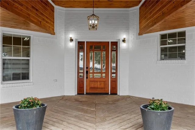 a view of an entryway of house and front door