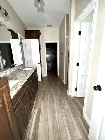 a view of a kitchen cabinets a sink and dishwasher in a kitchen