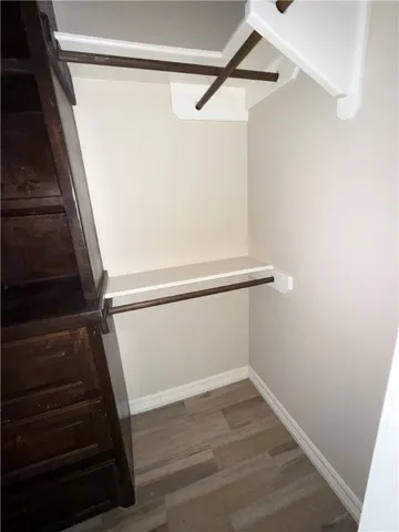 a view of an empty walk in closet