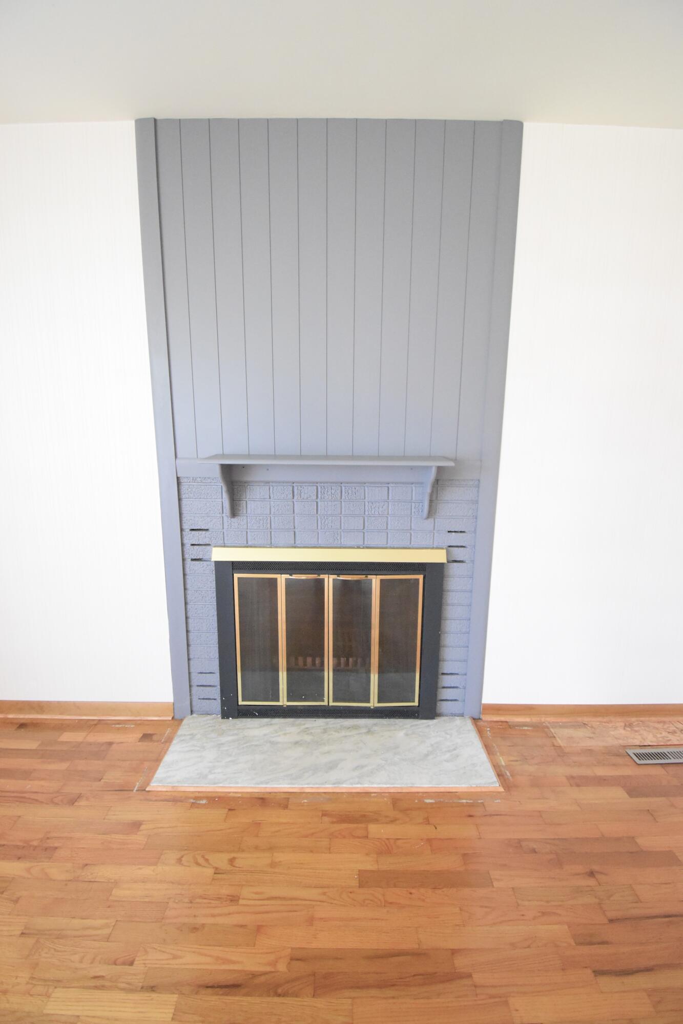 328 South Weston Street Rensselaer, IN 47978 - Photo 10 of 39 a view of an empty room with wooden floor