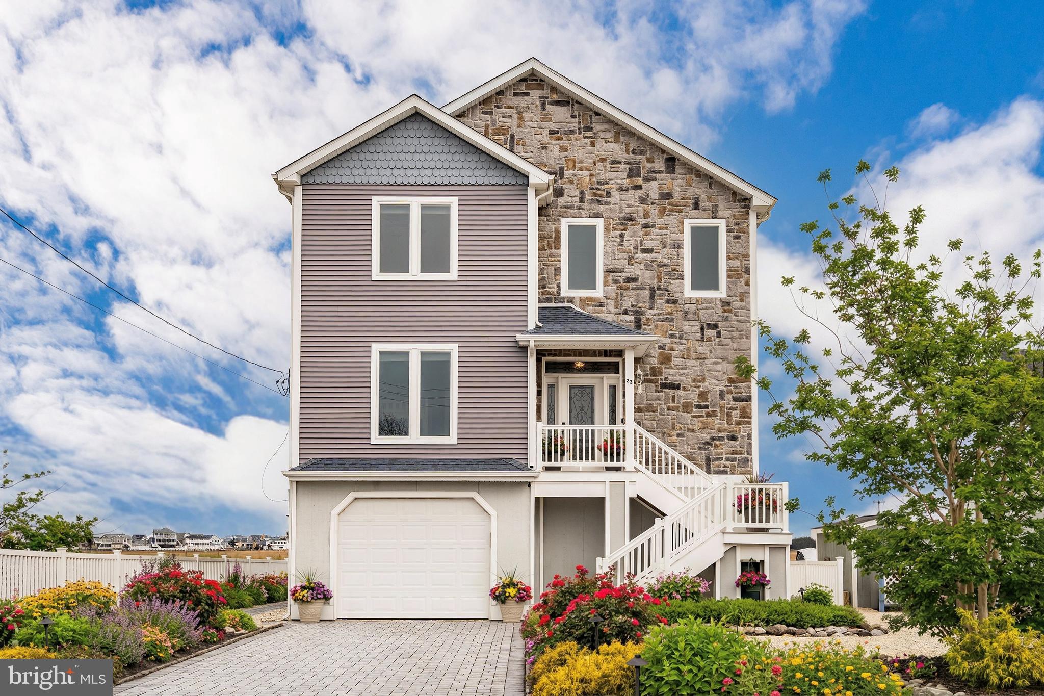 front view of a house with a small yard