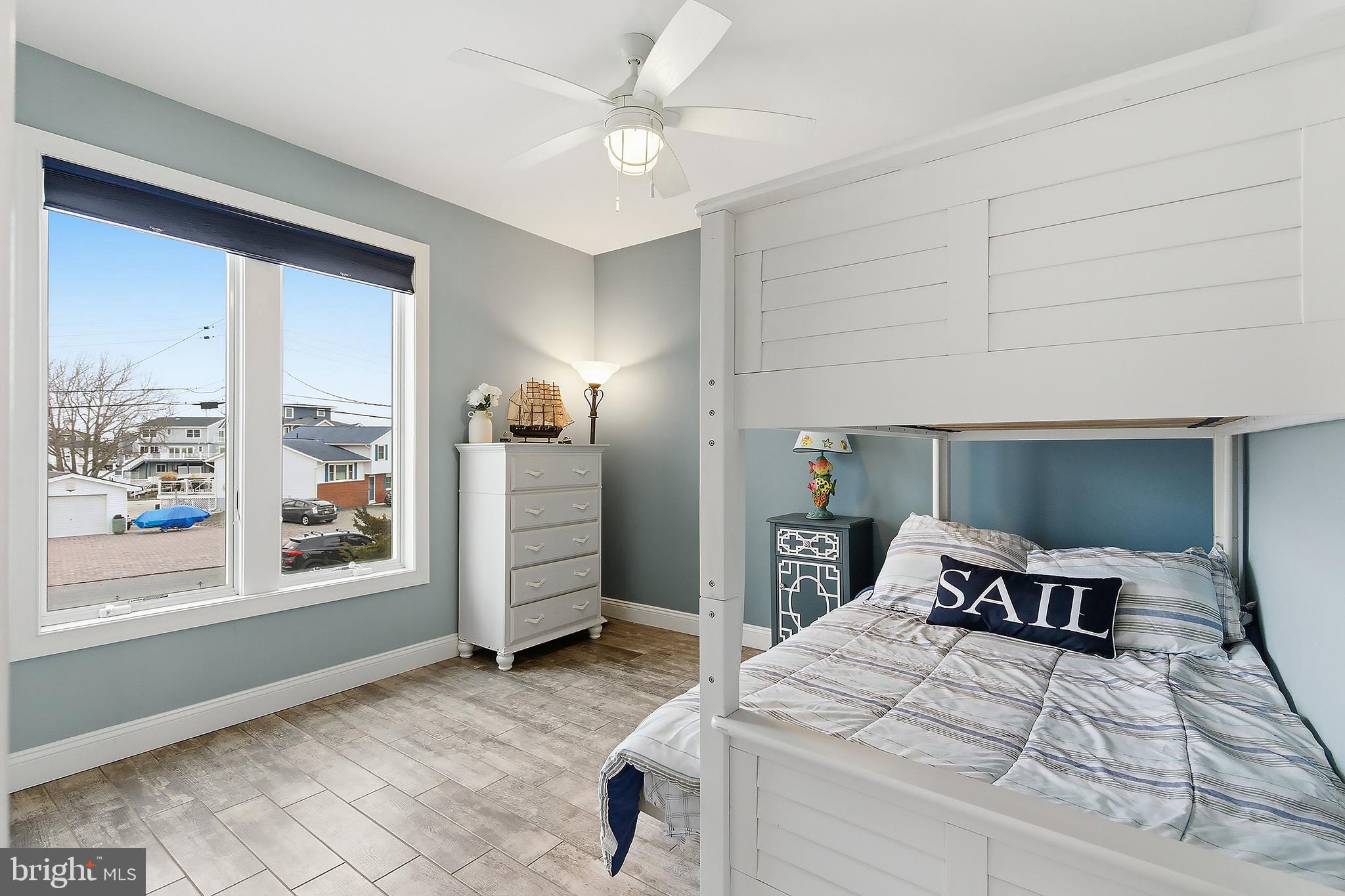 23 East Pimlico Road Little Egg Harbor, NJ 08087 - Photo 14 of 43 a bedroom with a bed and window
