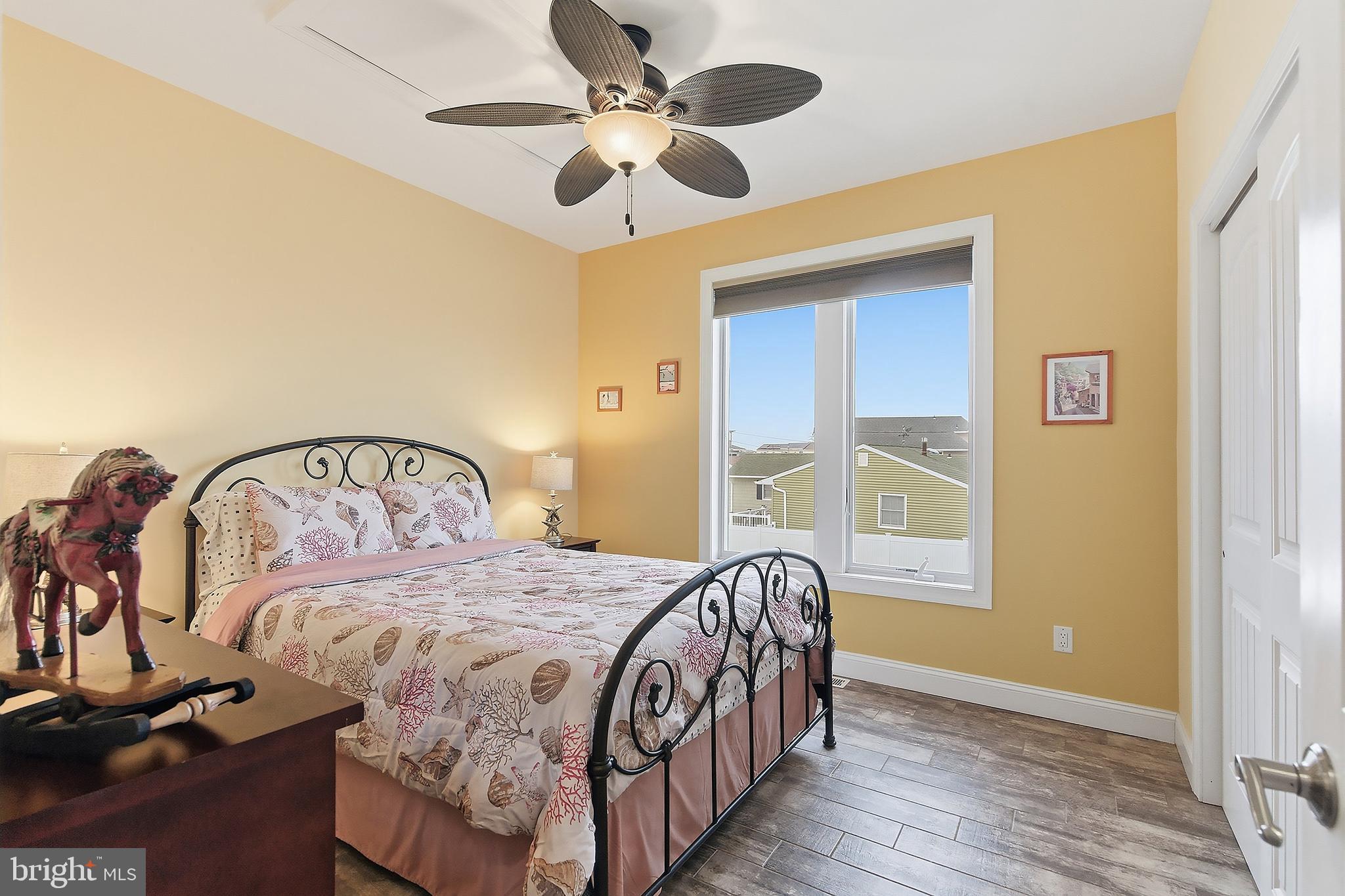 23 East Pimlico Road Little Egg Harbor, NJ 08087 - Photo 16 of 43 a bedroom with a bed and a window