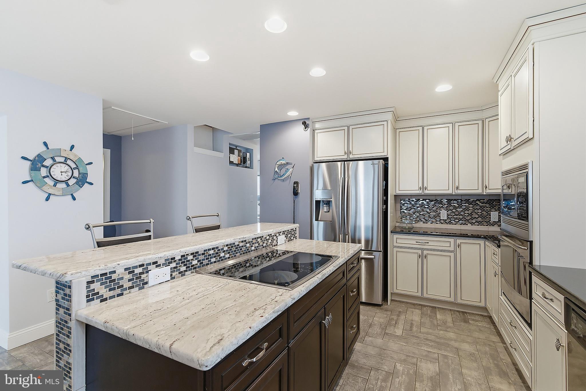 23 East Pimlico Road Little Egg Harbor, NJ 08087 - Photo 26 of 43 a kitchen with a sink stove and refrigerator
