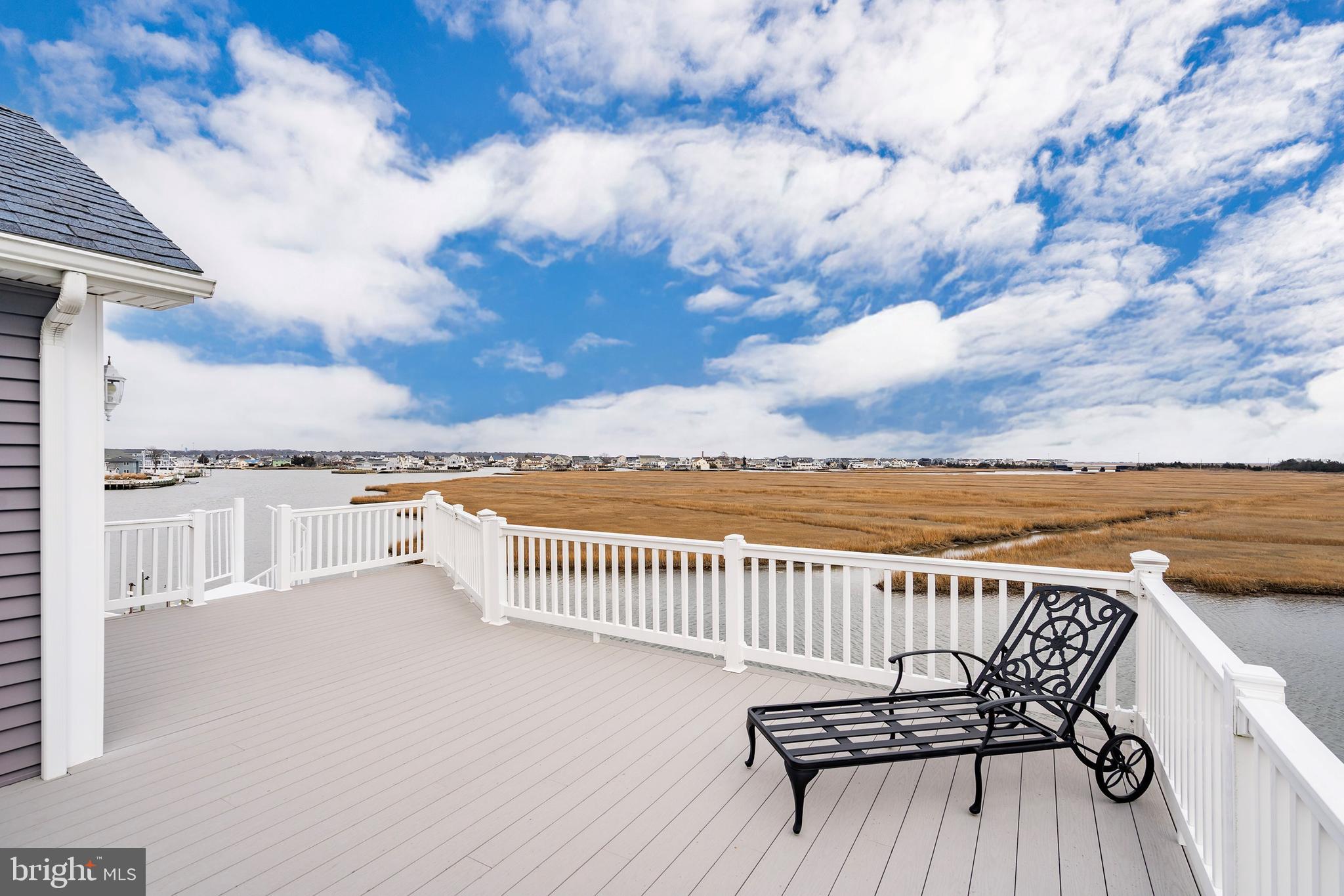 23 East Pimlico Road Little Egg Harbor, NJ 08087 - Photo 36 of 43 a view of a roof deck with wooden floor and fence