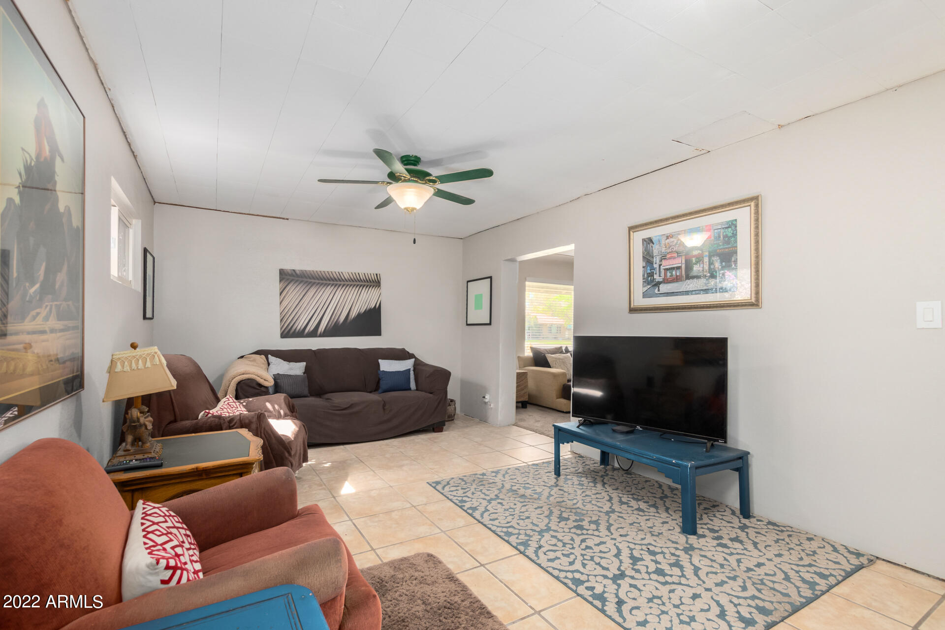 819 North Robson Mesa, AZ 85201 - Photo 12 of 45 a living room with furniture a rug and a window