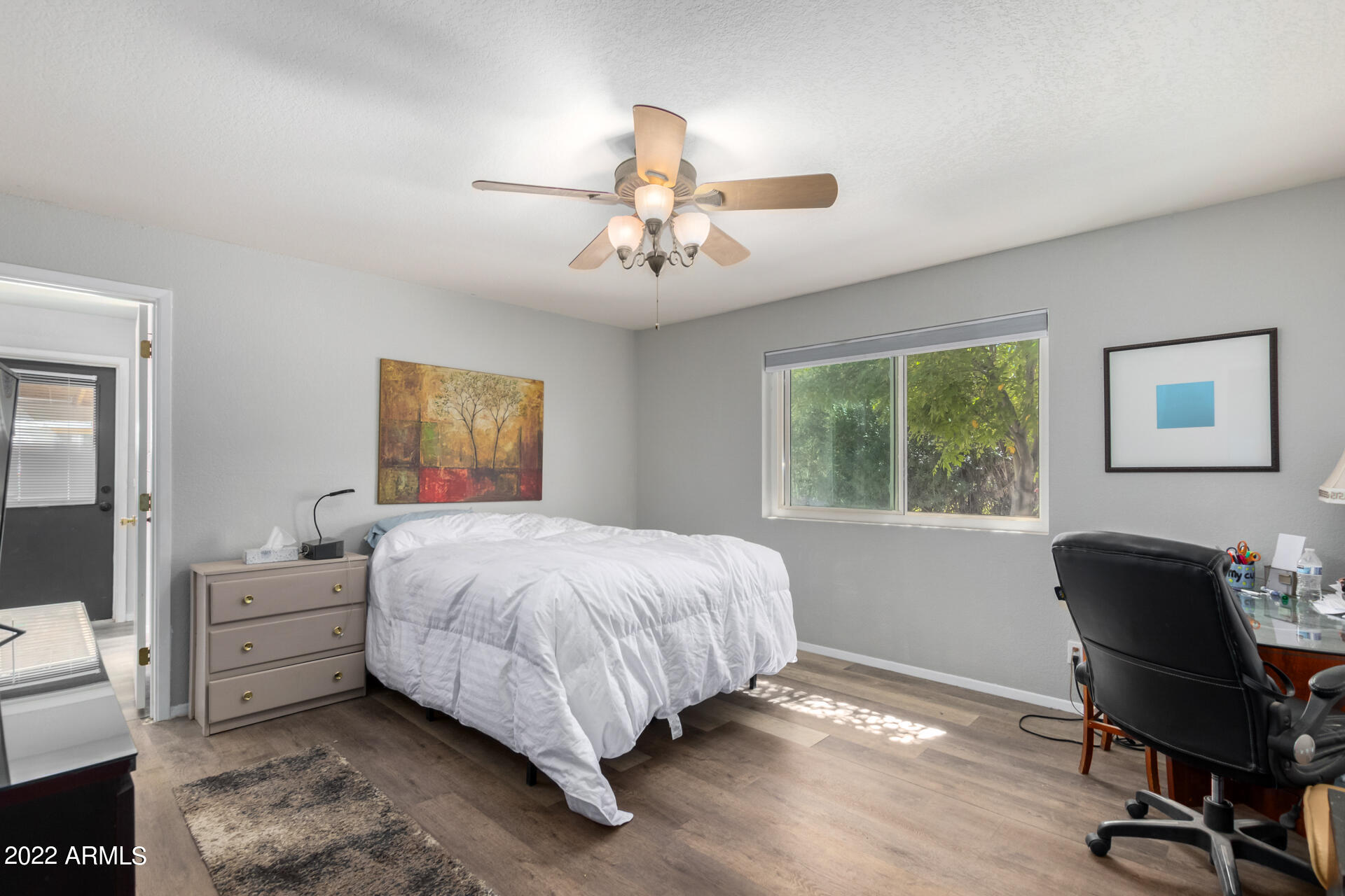 819 North Robson Mesa, AZ 85201 - Photo 21 of 45 a bedroom with a bed a desk and chair