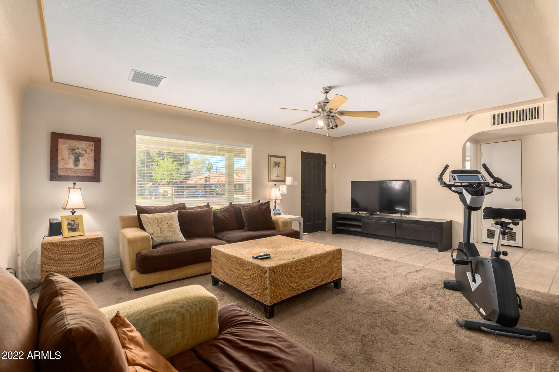 819 North Robson Mesa, AZ 85201 - Photo 10 of 45 a living room with furniture and a flat screen tv