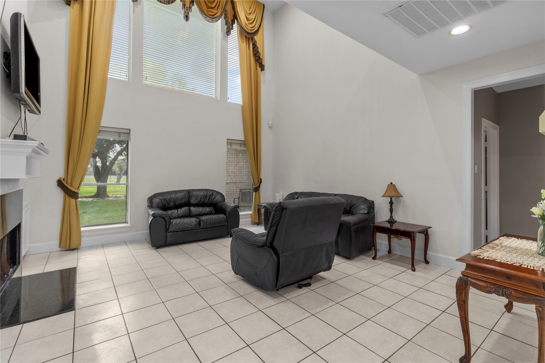 10302 Hanselman Road, Unit CR69 Manvel, TX 77578 - Photo 12 of 37 a living room with furniture and a flat screen tv