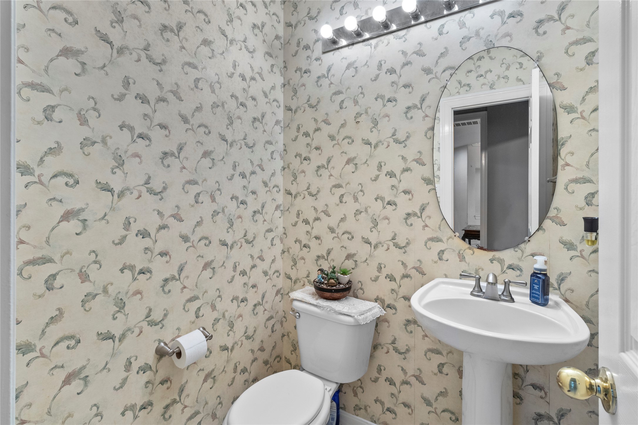 10302 Hanselman Road, Unit CR69 Manvel, TX 77578 - Photo 15 of 37 a bathroom with a sink and a toilet