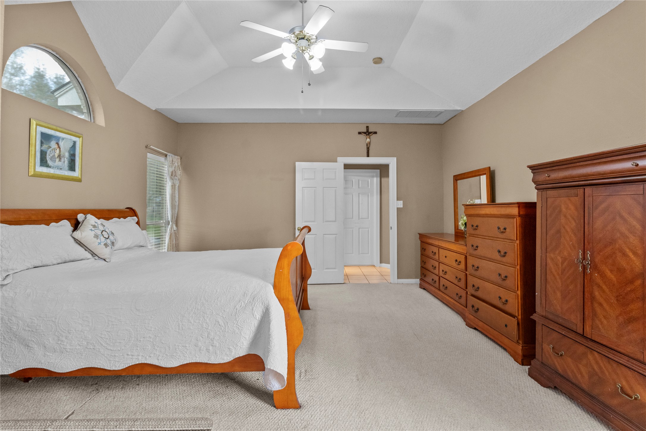 10302 Hanselman Road, Unit CR69 Manvel, TX 77578 - Photo 17 of 37 a bedroom with furniture and wooden floor