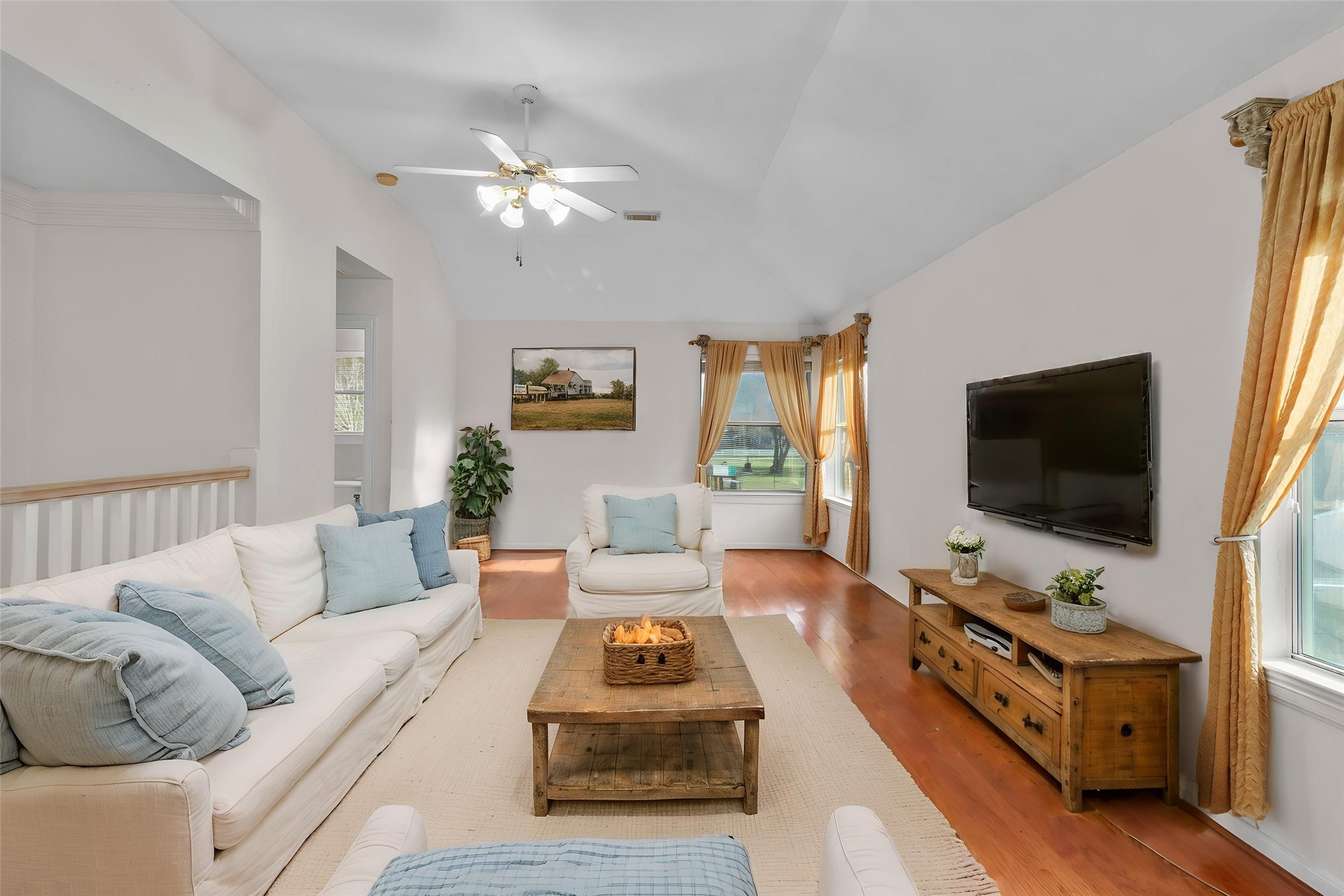 10302 Hanselman Road, Unit CR69 Manvel, TX 77578 - Photo 25 of 37 a living room with furniture and a flat screen tv
