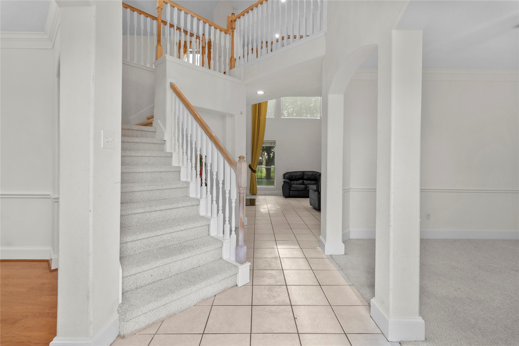 10302 Hanselman Road, Unit CR69 Manvel, TX 77578 - Photo 8 of 37 a view of staircase with white walls and white walls