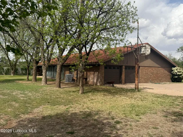 a house with trees in front of it