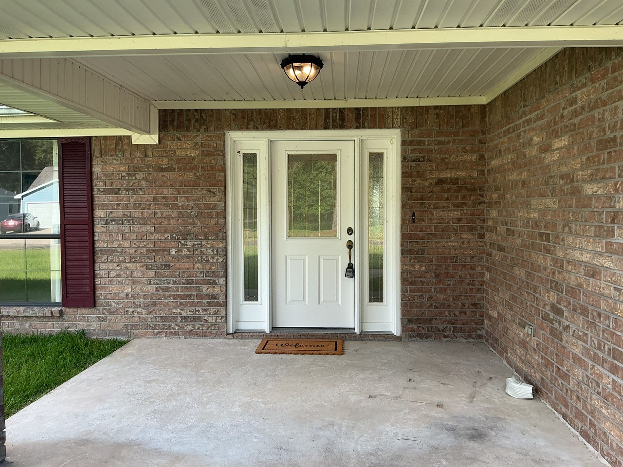 20 Shallow Springs Trinity, TX 75862 - Photo 2 of 48 a front view of a house with a garden