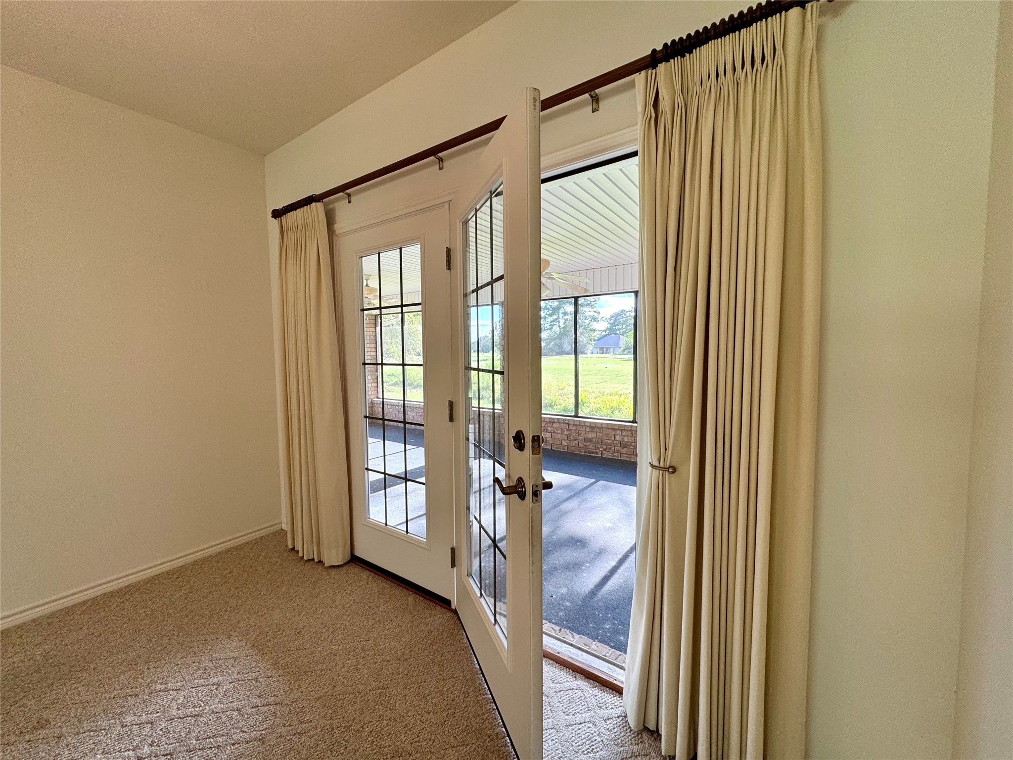 20 Shallow Springs Trinity, TX 75862 - Photo 28 of 48 a view of an empty room and glass door