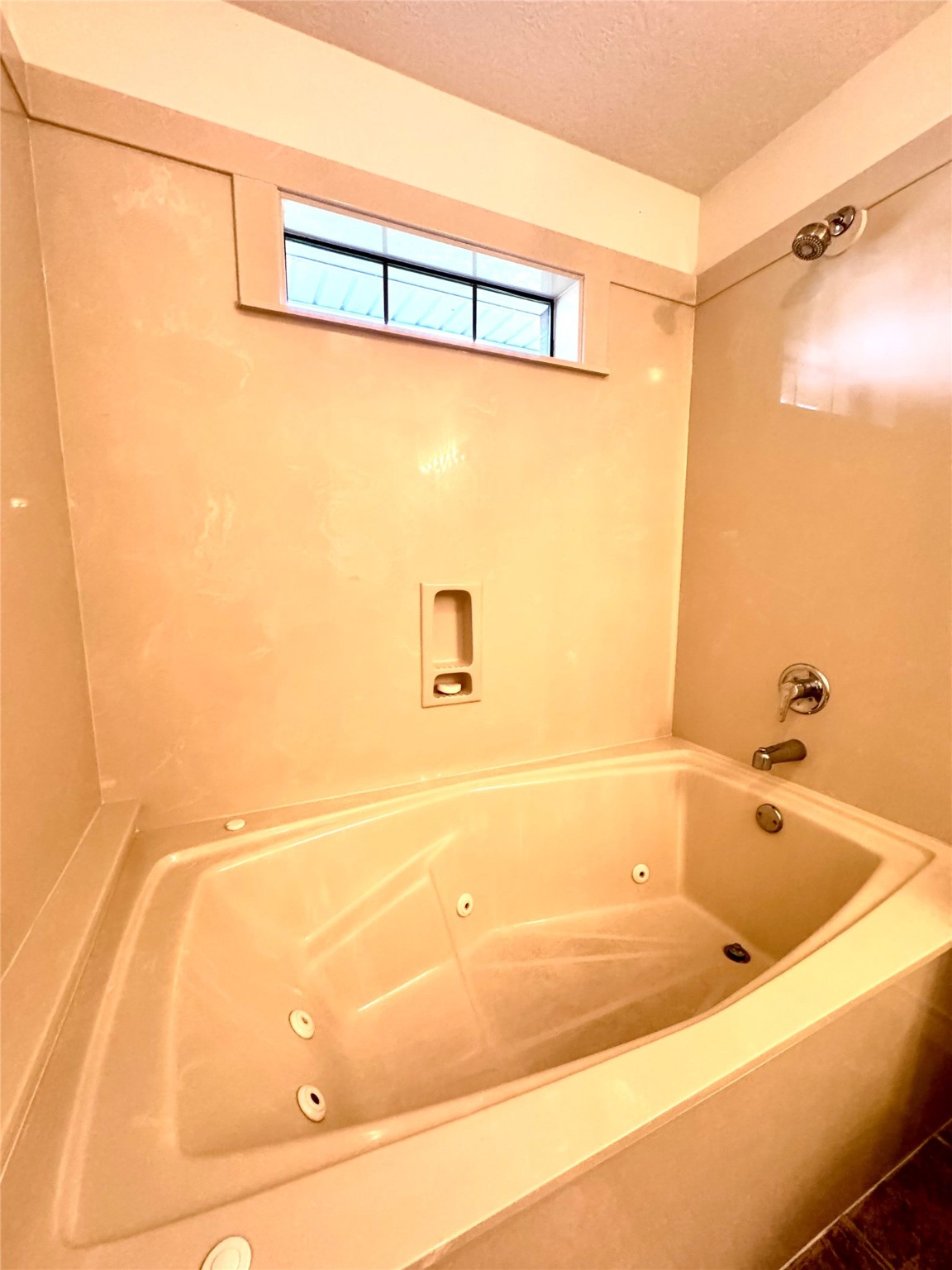 20 Shallow Springs Trinity, TX 75862 - Photo 37 of 48 a bathroom with a bathtub and a shower