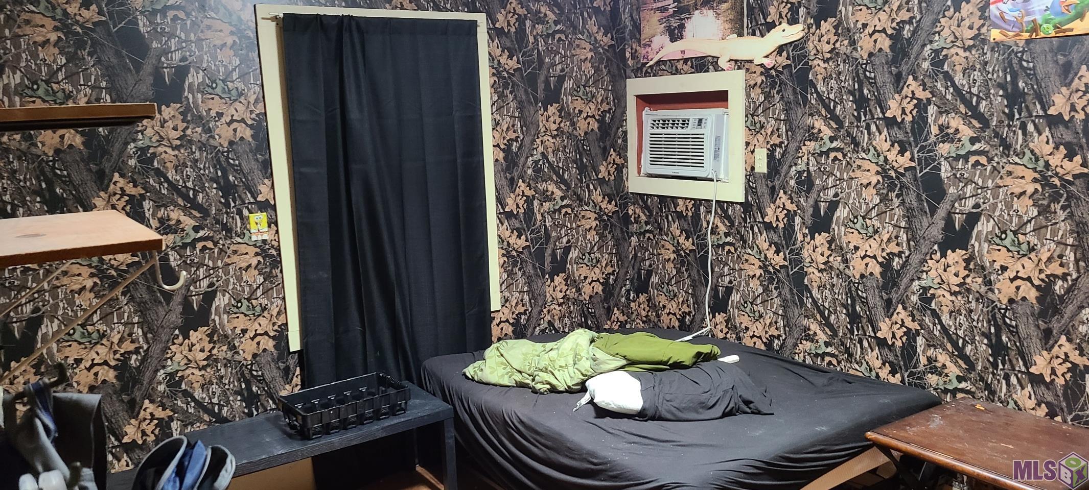 520 St Ann Street Raceland, LA 70394 - Photo 9 of 14 Camo Bedroom