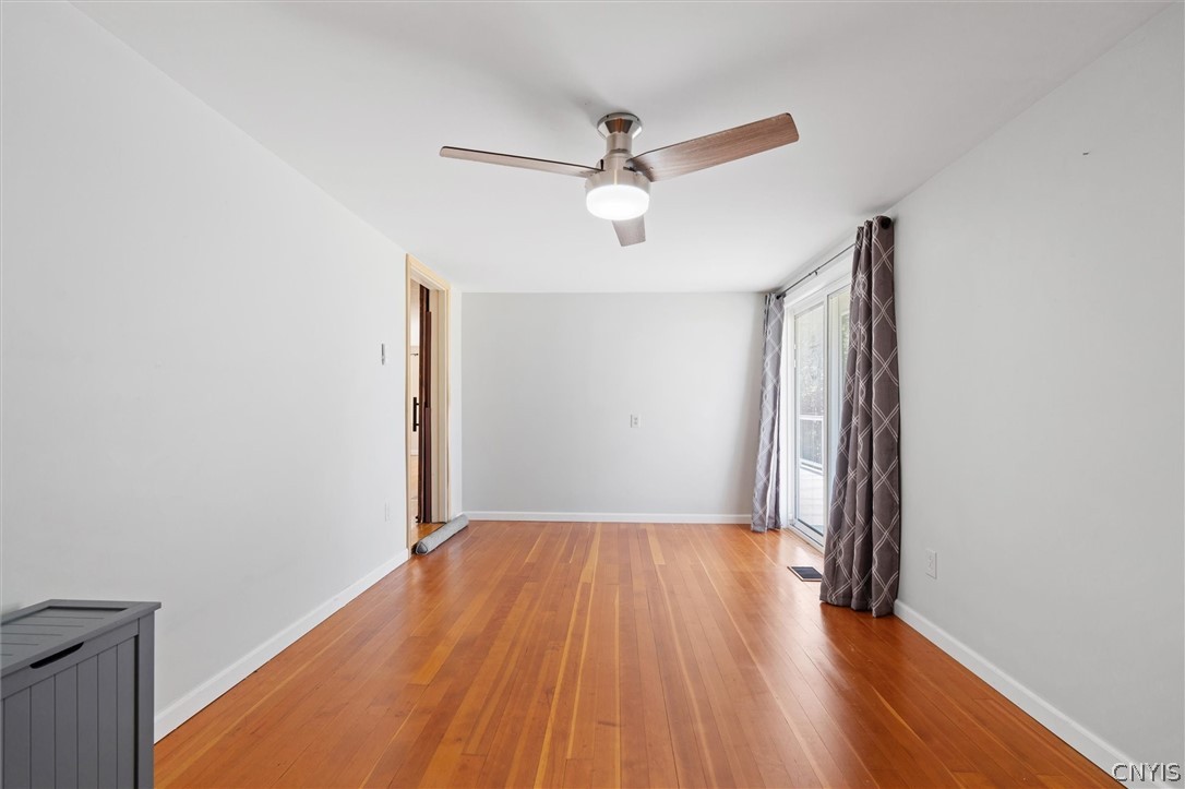 6869 Stevens Road Elbridge, NY 13080 - Photo 29 of 49 Primary bedroom with access to back deck.