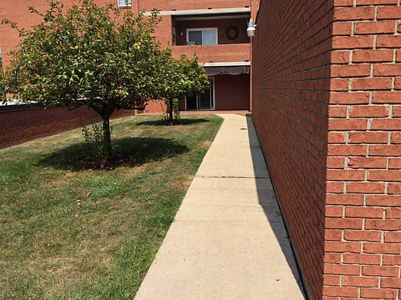 2850 Edgecliff Road, Unit C16 Lower Burrell, PA 15068 - Photo 22 of 25 Exterior Back.