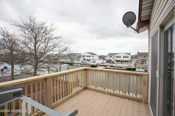 a view of a balcony with city view