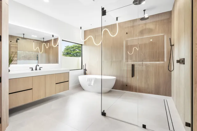 a front view of a house with swimming pool having outdoor seating