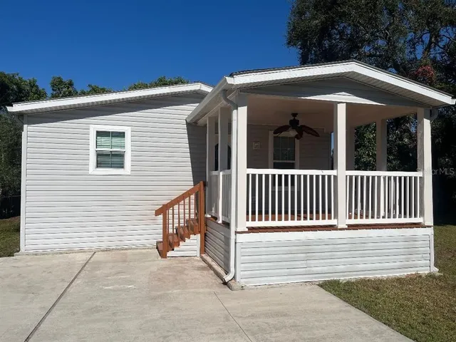 a view of a house with a porch