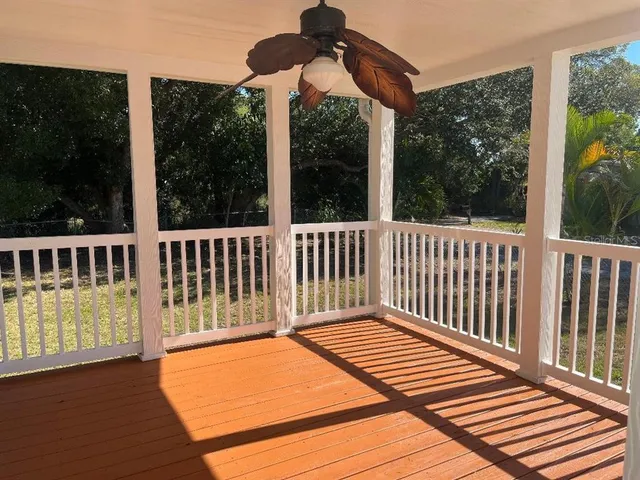 a view of a two chairs in the deck