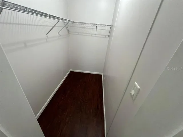 a view of a room with racks on the wall