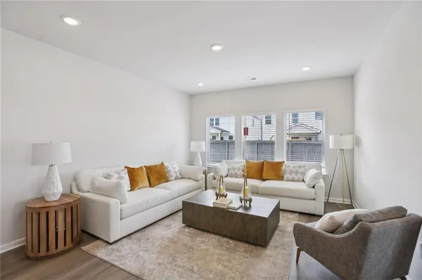a living room with furniture and a couch