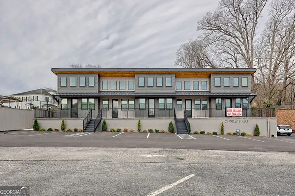 a view of a building with a street