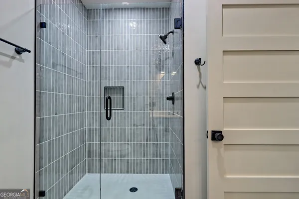 a kitchen with stainless steel appliances a refrigerator sink and cabinets
