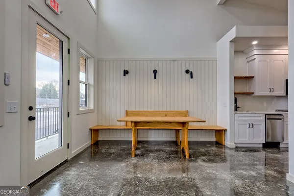 a bathroom with a sink and mirror