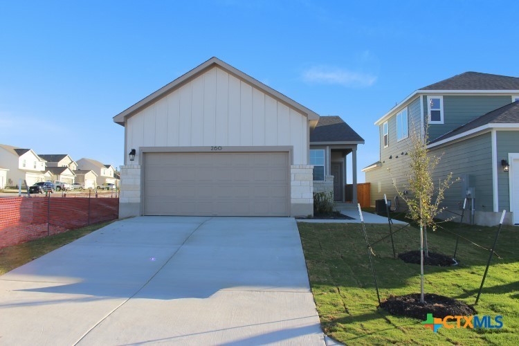 260 Escape Way Jarrell, TX 76537 - Photo 1 of 12 a view of backyard of the house