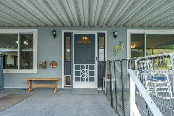 a view of a hallway with closet and garden