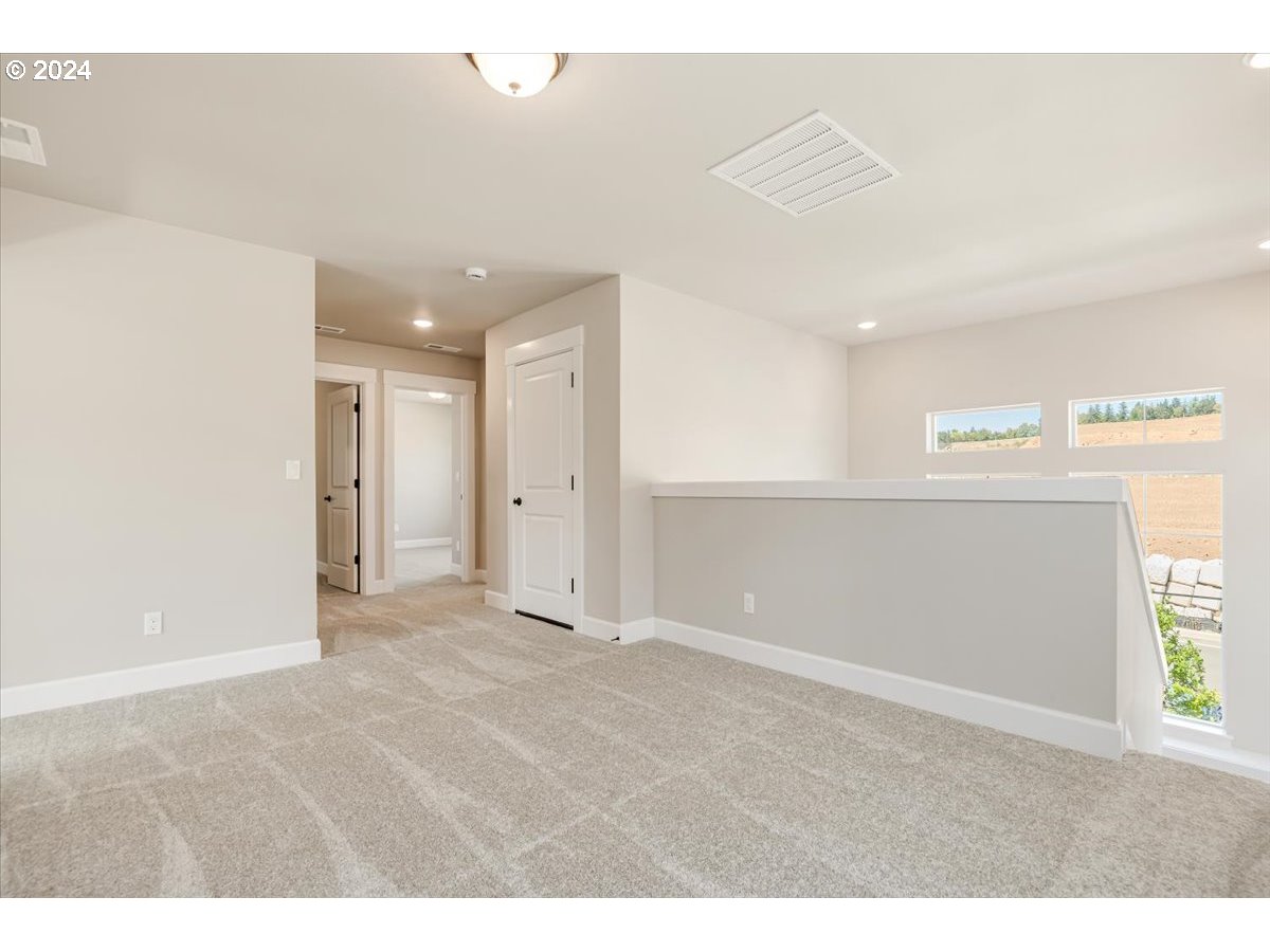 18050 Southwest Barrows Road Beaverton, OR 97007 - Photo 19 of 45 a view of an empty room