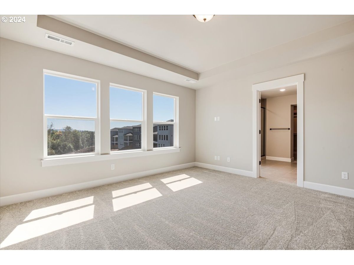 18050 Southwest Barrows Road Beaverton, OR 97007 - Photo 21 of 45 a view of an empty room with a window