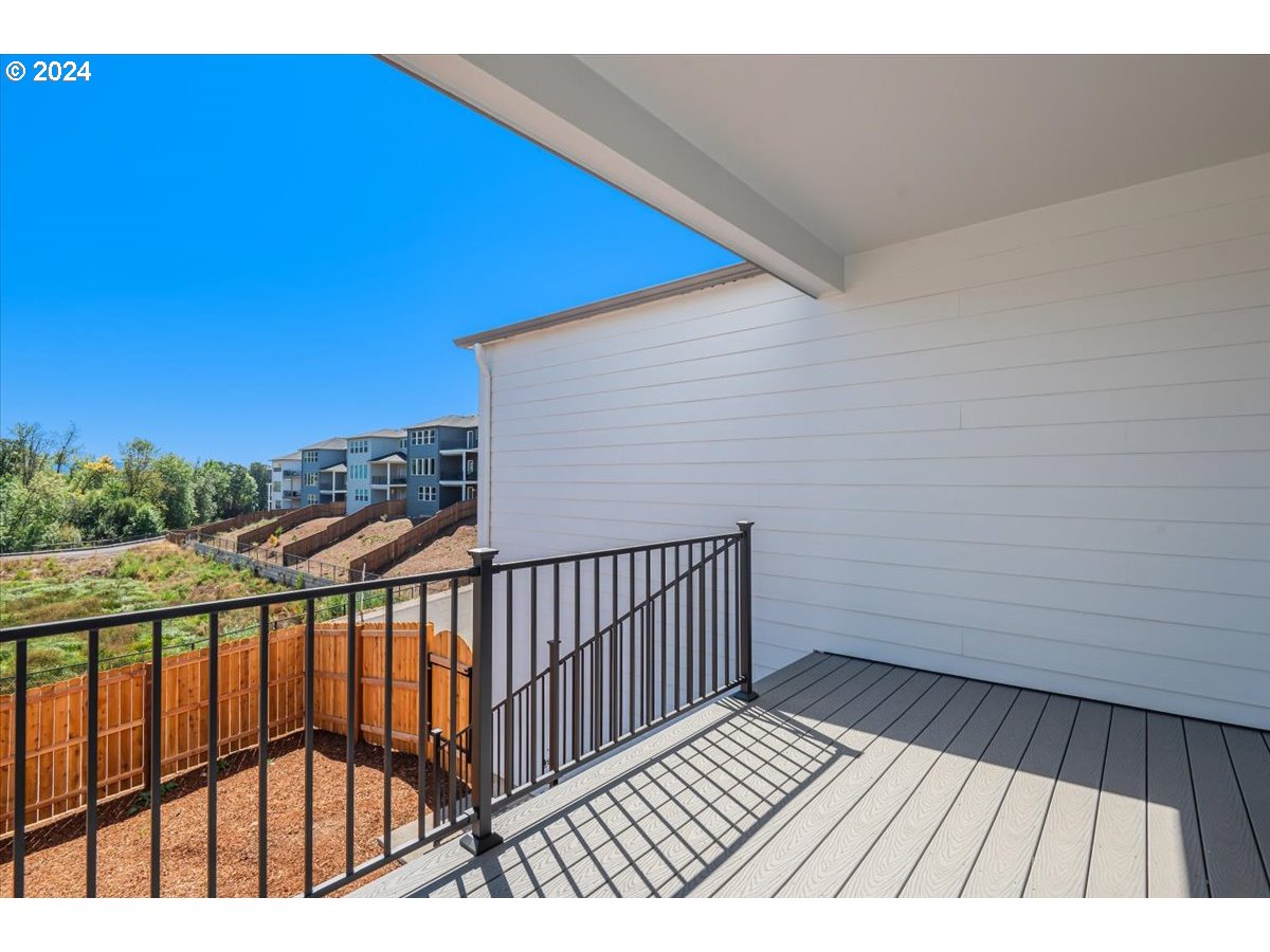 18050 Southwest Barrows Road Beaverton, OR 97007 - Photo 28 of 45 a view of balcony with wooden floor