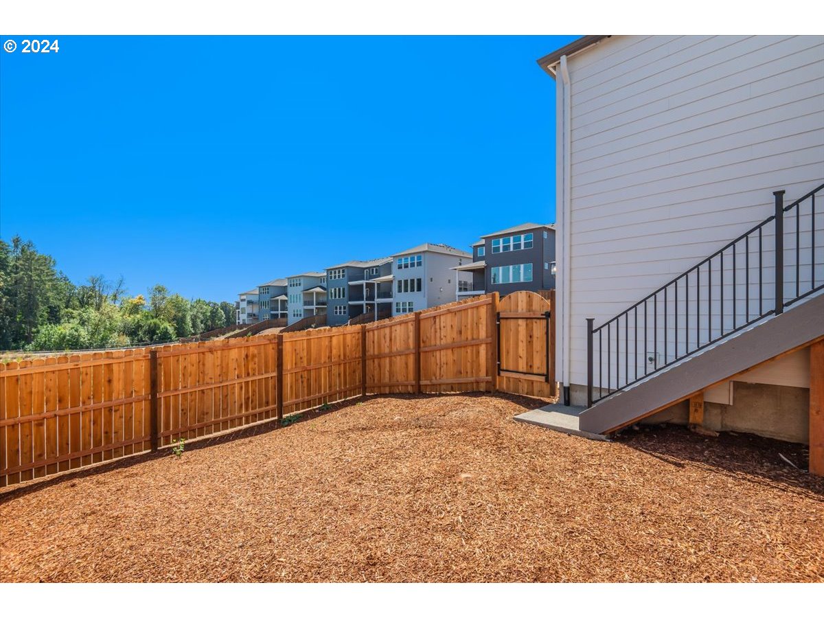 18050 Southwest Barrows Road Beaverton, OR 97007 - Photo 30 of 45 a view of a backyard