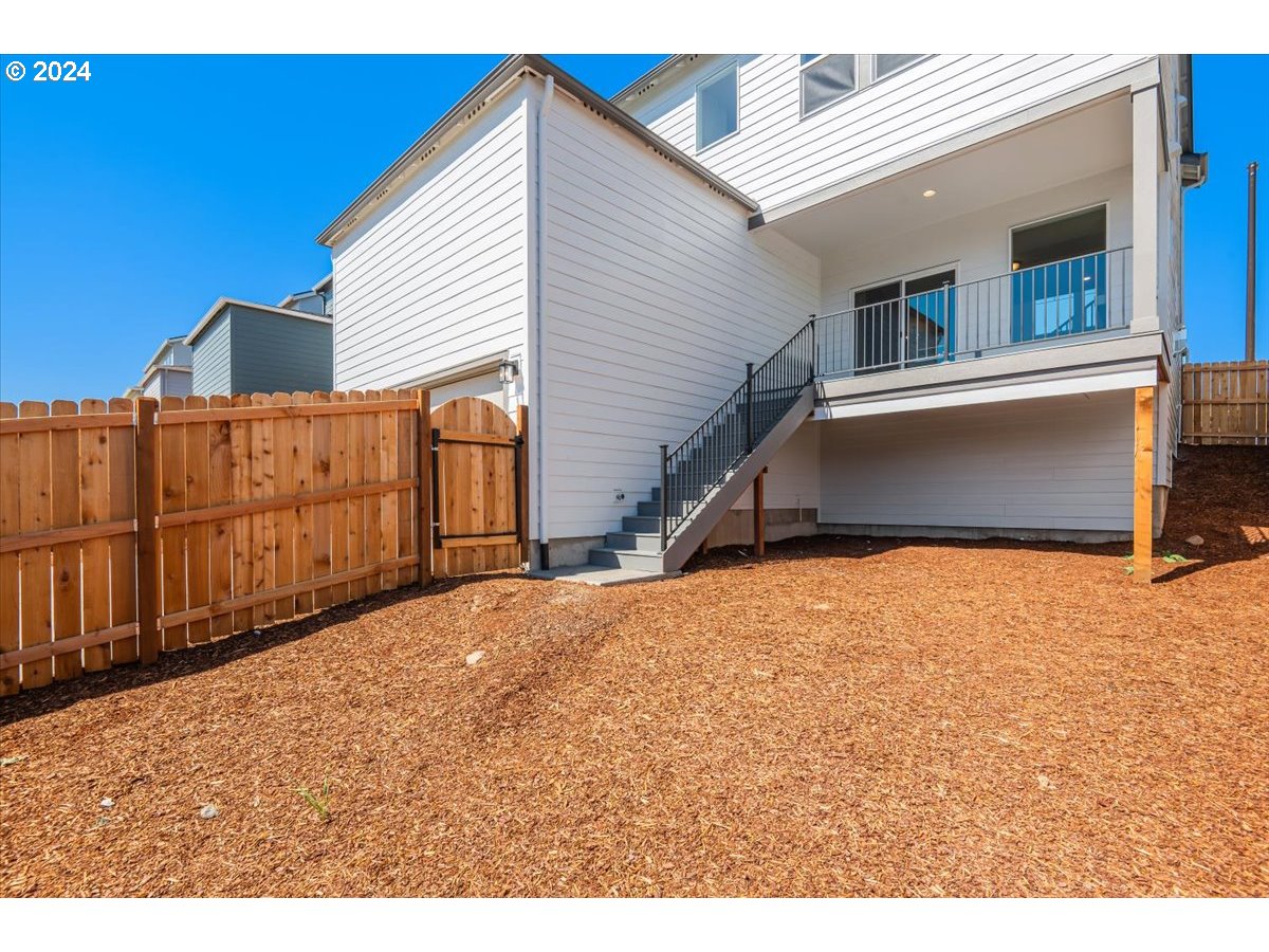 18050 Southwest Barrows Road Beaverton, OR 97007 - Photo 31 of 45 a view of a backyard of the house