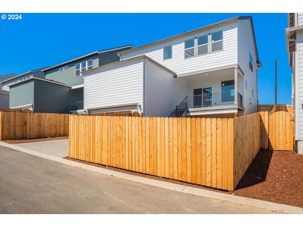 18050 Southwest Barrows Road Beaverton, OR 97007 - Photo 33 of 45 a view of a house with a outdoor space