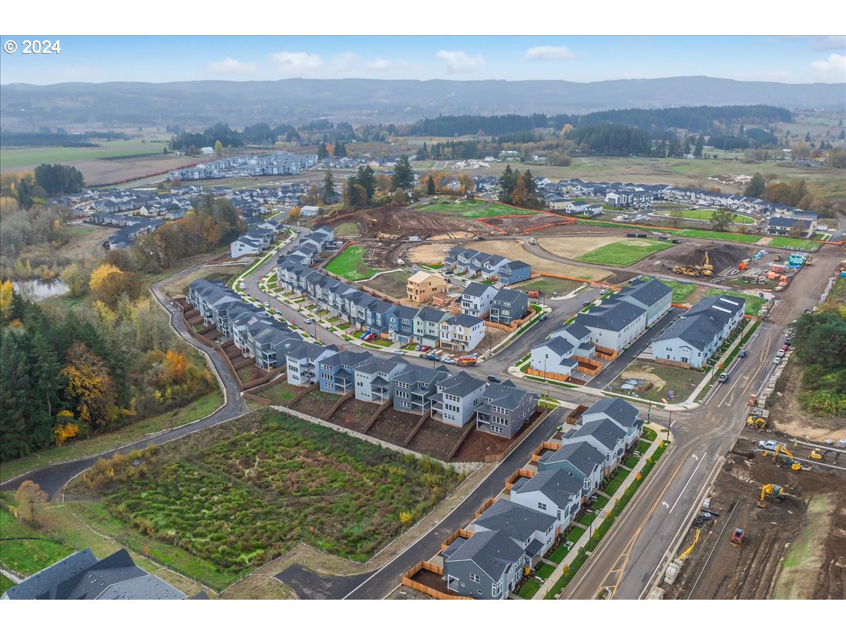 18050 Southwest Barrows Road Beaverton, OR 97007 - Photo 34 of 45 an aerial view of residential houses with outdoor space