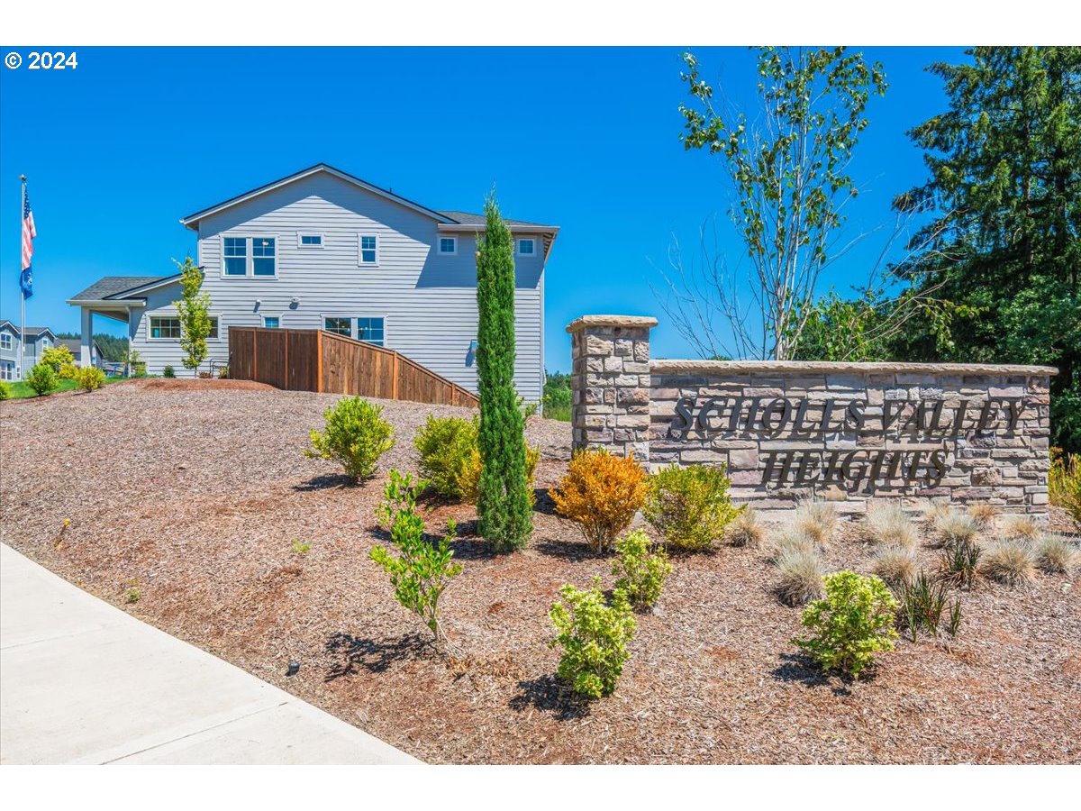 18050 Southwest Barrows Road Beaverton, OR 97007 - Photo 41 of 45 a front view of a house with a yard