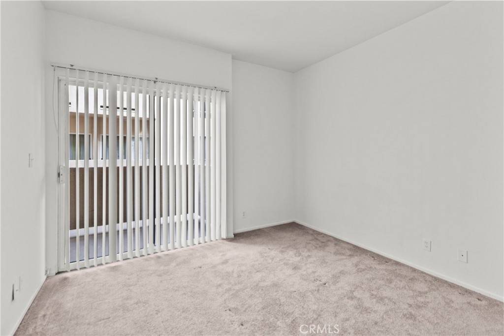 19350 Sherman Way, Unit 125 Reseda, CA 91335 - Photo 14 of 20 an empty room with a window