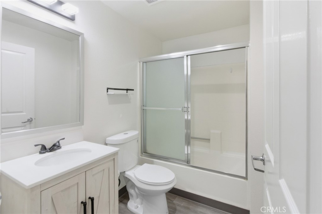 19350 Sherman Way, Unit 125 Reseda, CA 91335 - Photo 9 of 20 a bathroom with a sink toilet and shower