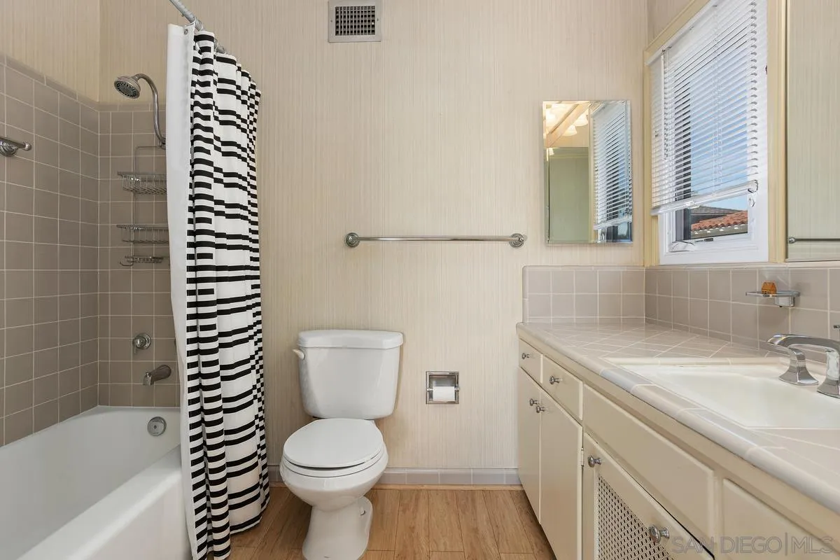 6138 La Flecha Rancho Santa Fe, CA 92067 - Photo 7 of 14 a bathroom with a sink a toilet and a bathtub