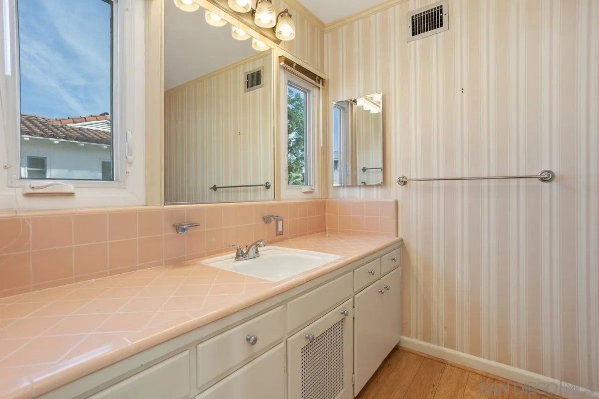 6138 La Flecha Rancho Santa Fe, CA 92067 - Photo 10 of 14 a bathroom with a sink and a mirror