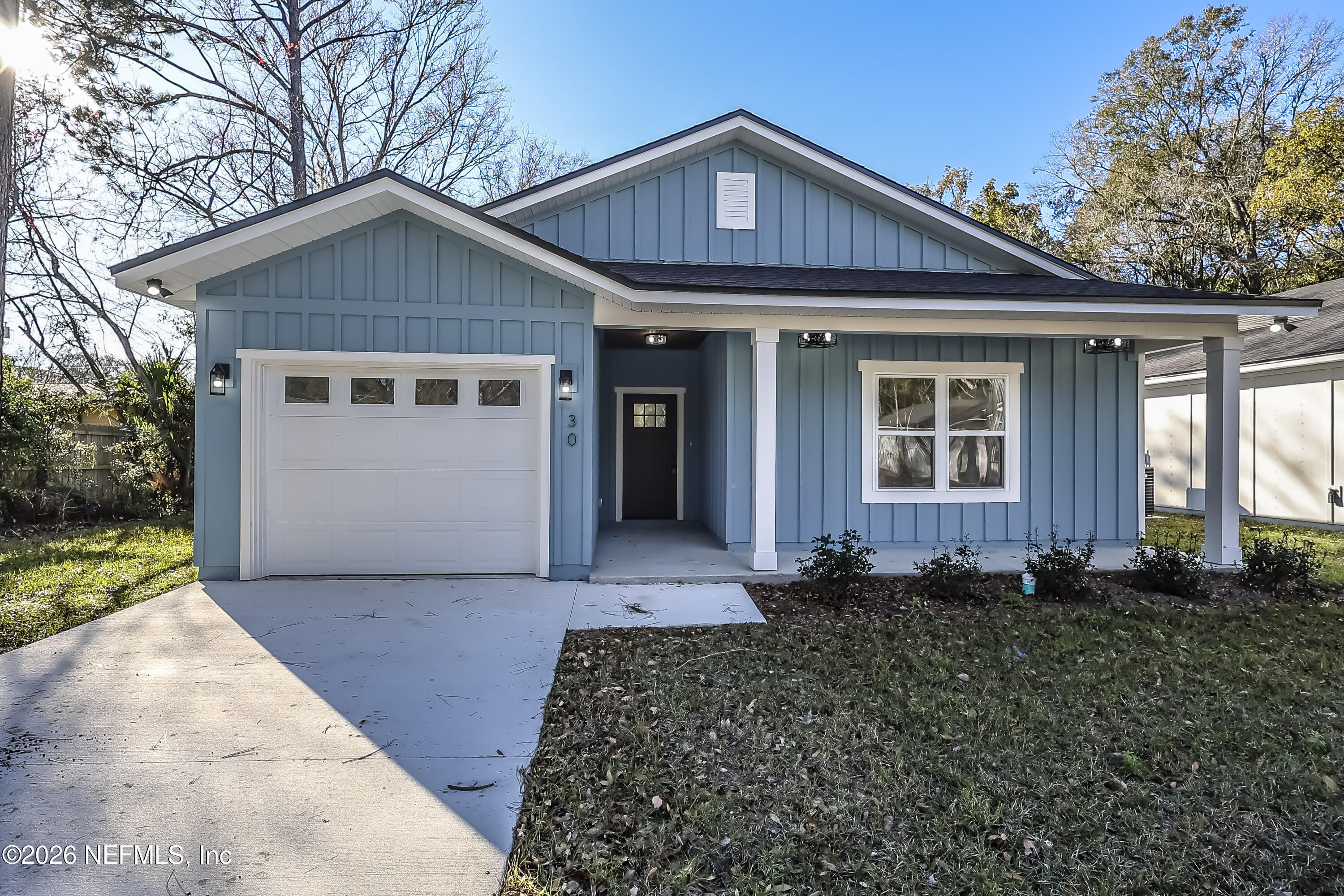 30 Delmonte Street Baldwin, FL 32234 - Photo 2 of 37 a front view of a house with a yard