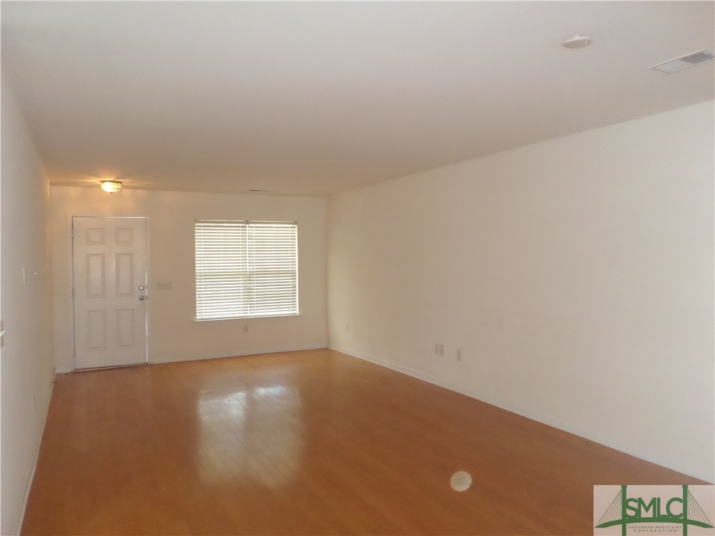 244 Opus Court Pooler, GA 31322 - Photo 2 of 27 Living/dining room
