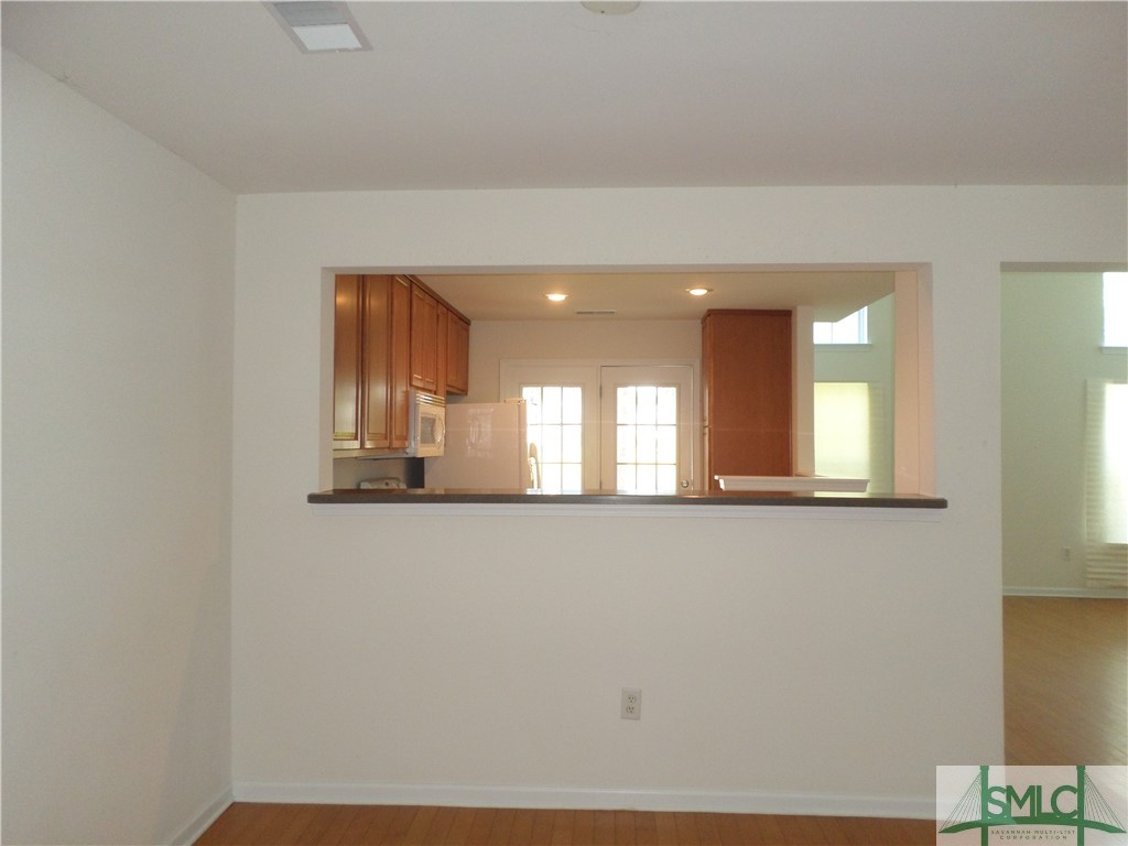 244 Opus Court Pooler, GA 31322 - Photo 4 of 27 Open window from kitchen to living/dining